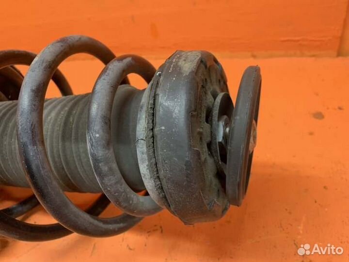 Стойка амортизатора передняя левая Chevrolet