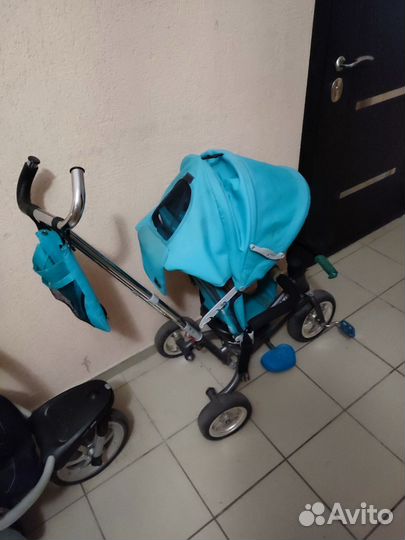 Коляска велосипед с ручкой