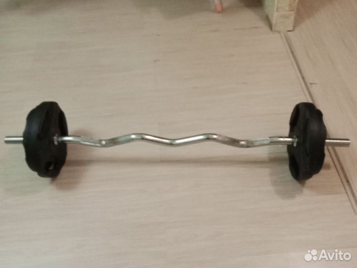 Изогнутый гриф с блинами