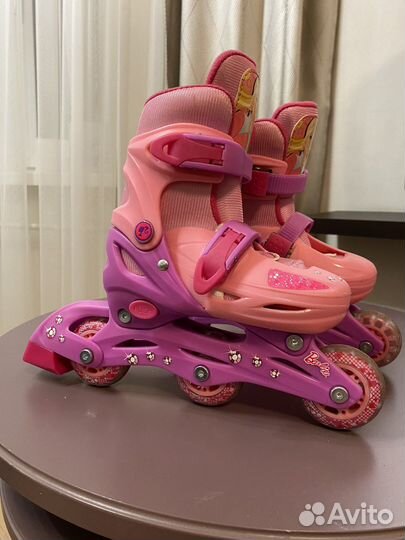 Роликовые коньки