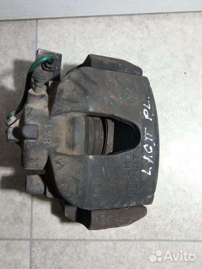 Суппорт тормозной передний левый Renault Laguna 2