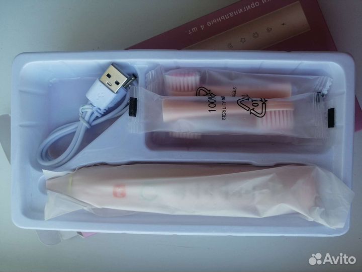 Электрическая зубная щетка