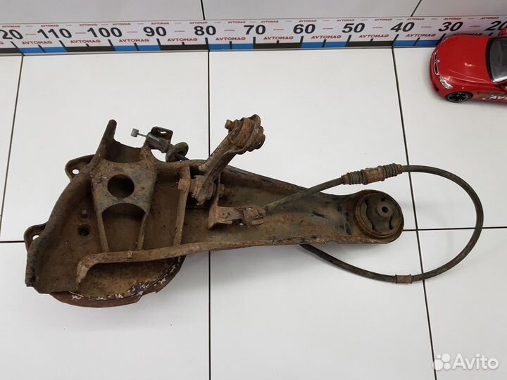 Рычаг задний левый продольный (Mitsubishi Lancer)