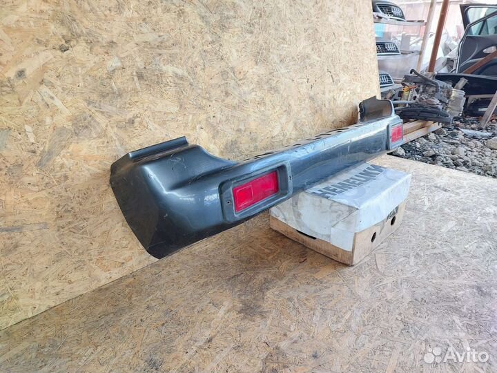 Бампер задний Mitsubishi Pajero Sport 1 до рест