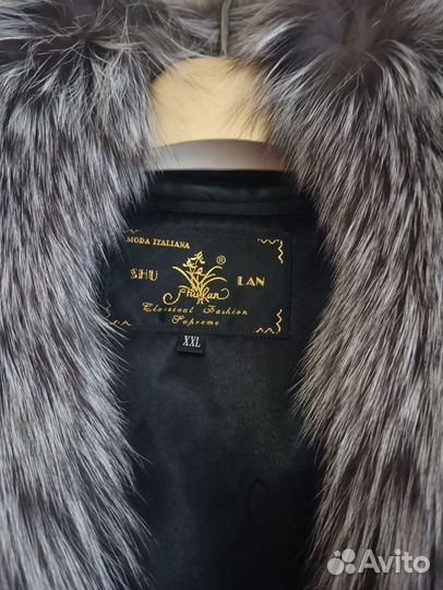 Пальто кожаное с меховым воротником