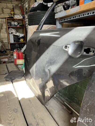 Двери левые Toyota Corolla e150