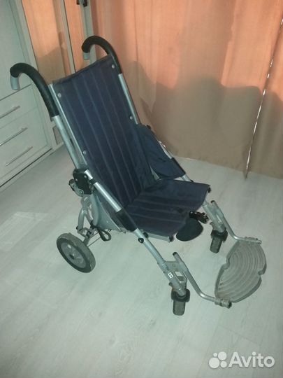 Детская инвалидная коляска