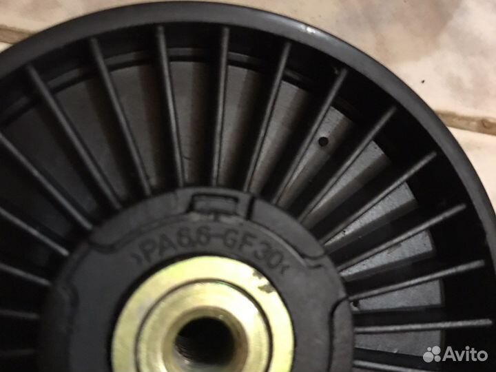 Натяжной ролик