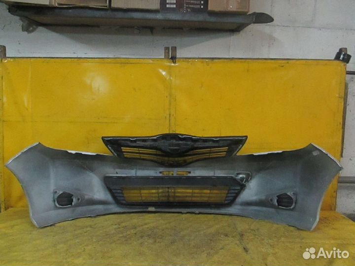 Бампер 52119-52710/30 на Toyota Vitz KSP130