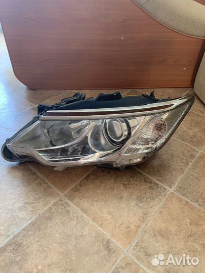 Фара левая Toyota Camry 55 AFS