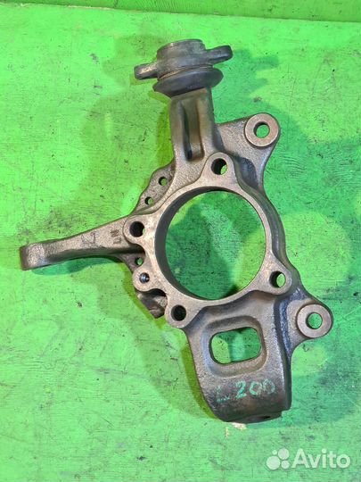 Кулак передний левый Mitsubishi L200 2006-2016