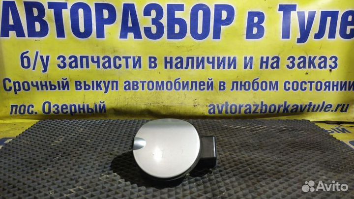 Лючок бензобака Ford Escort