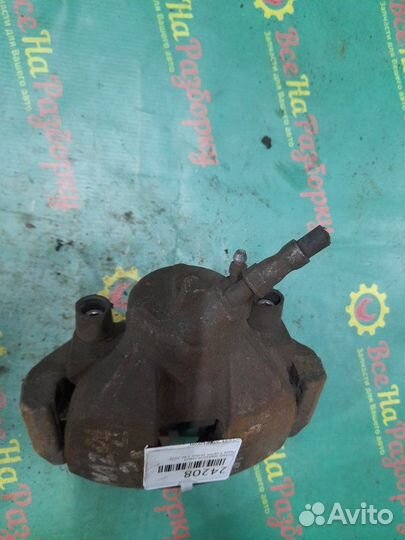 Суппорт передний левый Mazda 3-Series хечбэк 1.6Л