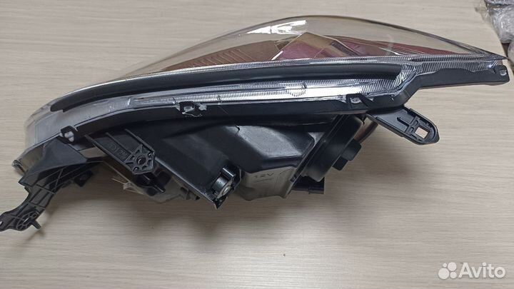 Фара правая Mitsubishi Lancer IX под эл.корректор