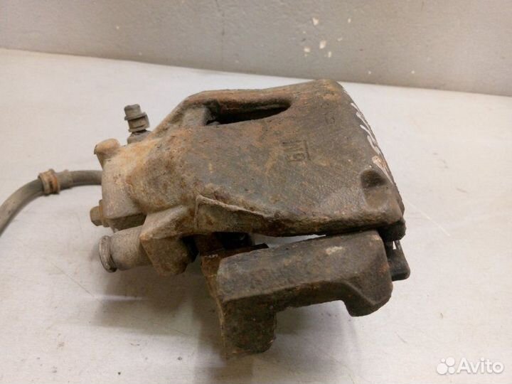 Суппорт передний левый Opel Astra H 2010