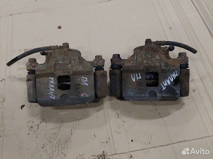 Суппорт передний левый Mitsubishi Galant 8