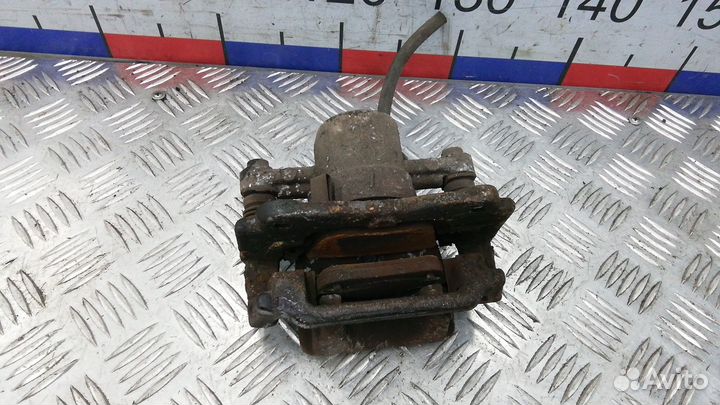 Суппорт задний левый Toyota Corolla Verso