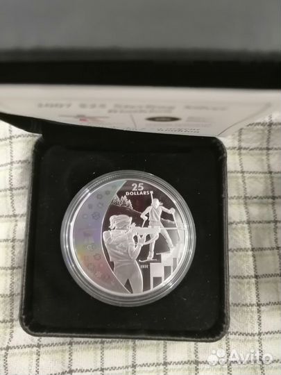 Серебрянные иностранные монеты спорт