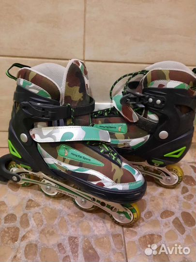 Роликовые коньки