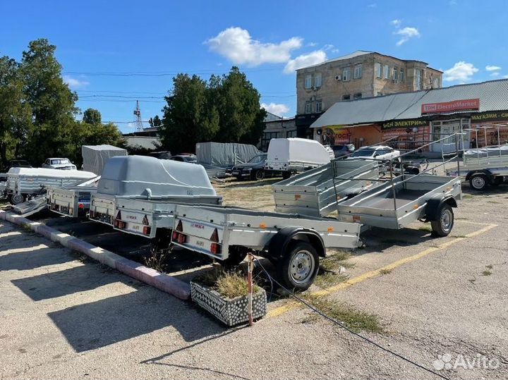 Прицеп двухосный с тентом, дополнительными бортами