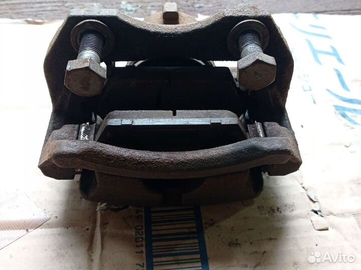 Суппорт перед Nissan Primera P12 оригинал