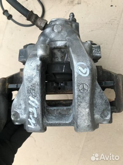 Суппорт левый задний на Mercedes W211 2.2 CDI