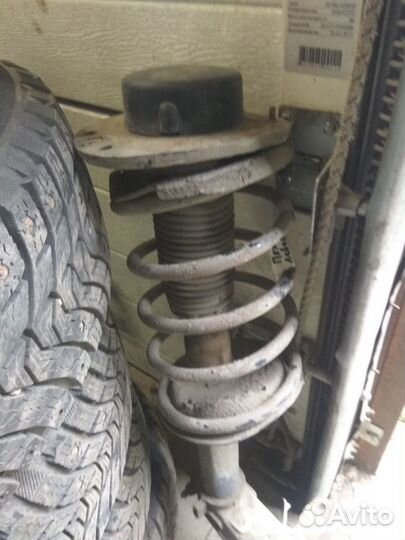 Амортизатор стойка передний левый Пежо 206