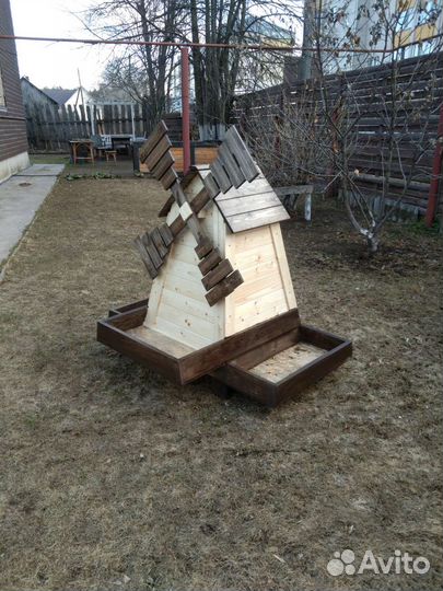 Цветник мельница для сада