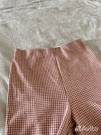 Брюки в клетку с разрезами