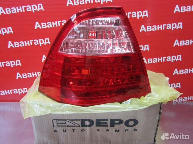 Фонарь левый Toyota Corolla E120 2004-2006