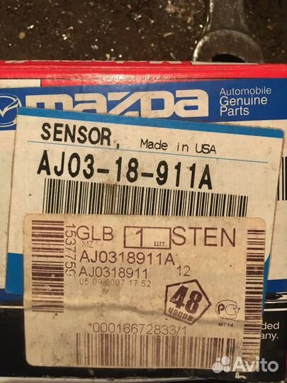 Датчик мазда AJ03-18-911А