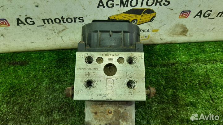 Блок насос контроллер ABS Nissan Primera P11