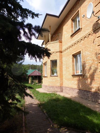 Коттедж 448 м² на участке 10 сот.