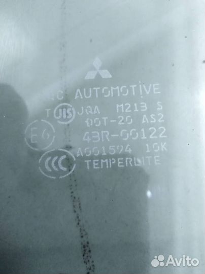 Стекло двери задней левой Mitsubishi Lancer X CX