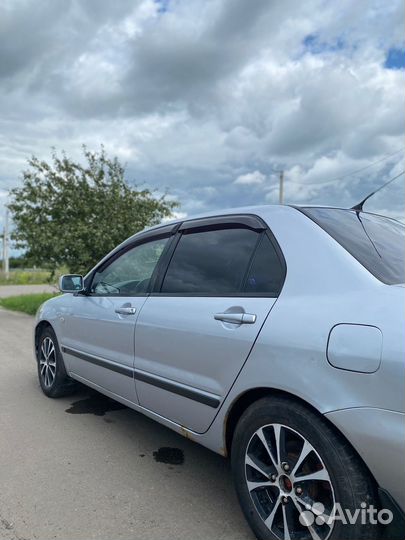 Mitsubishi Lancer 1.6 МТ, 2004, 232 000 км
