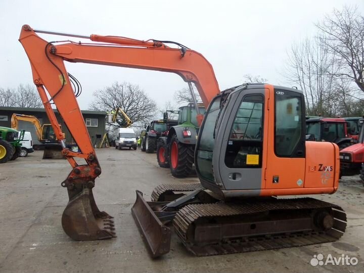 Стекло лобовое нижнее экскаватор гусеничный Hitach