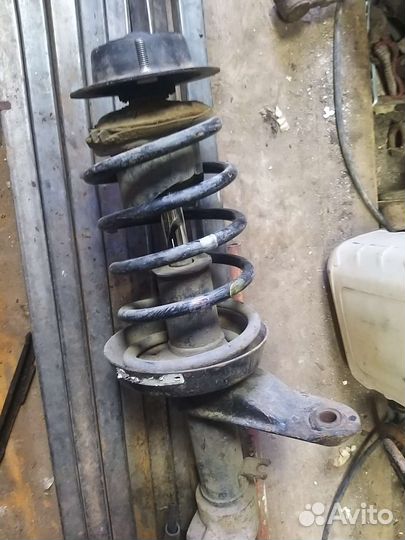 Стойка левая део нексия в сборе