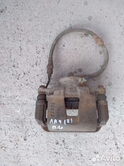 Суппорт передний левый Chevrolet Lacetti