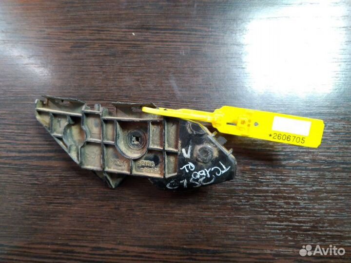 Кронштейн бампера задний левый Toyota Corolla E150