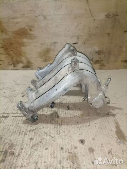 Впускной коллектор Митсубиси Лансер 8