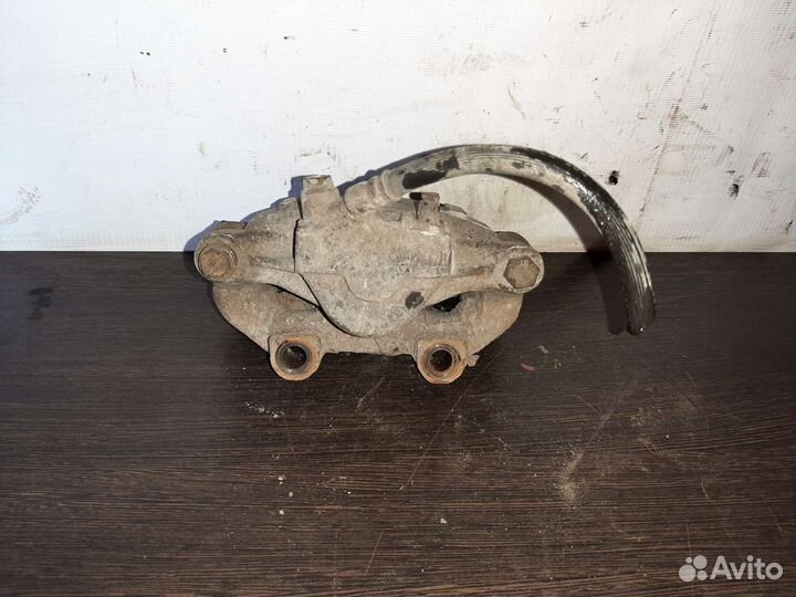 Ssangyong musso суппорт задний левый