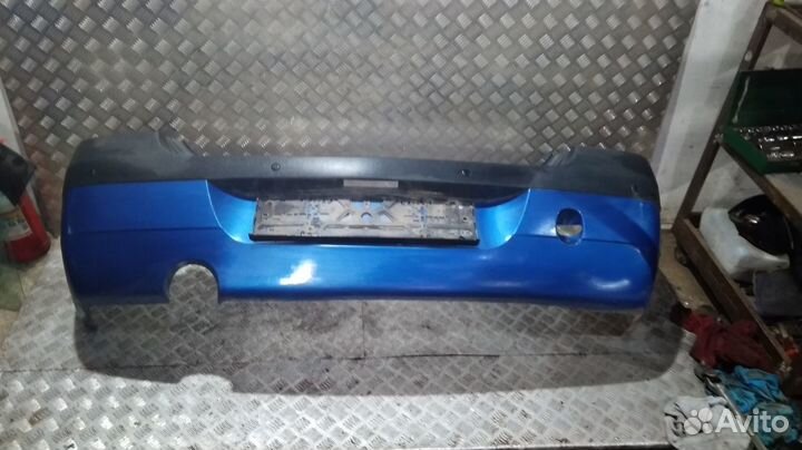 Бампер Logan (04-10) зад под парктроник Б\У