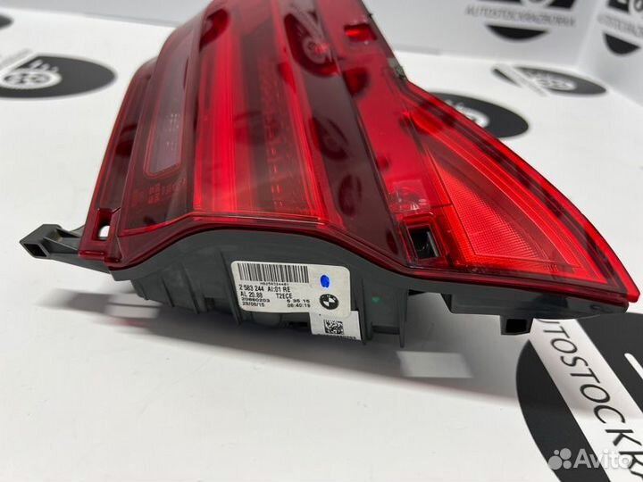 Фонарь в крышку багажника задний правый Bmw 730