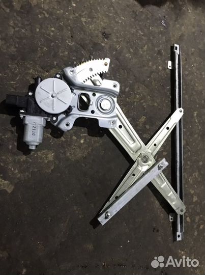 Mitsubishi Lancer 10 - Стеклоподьемник передней ле