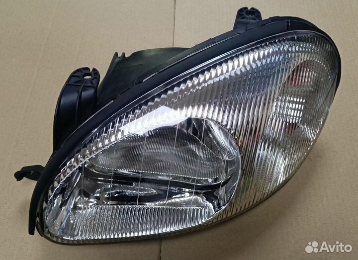 Фара передняя левая под корр. (чёрн.корп.) Lanos