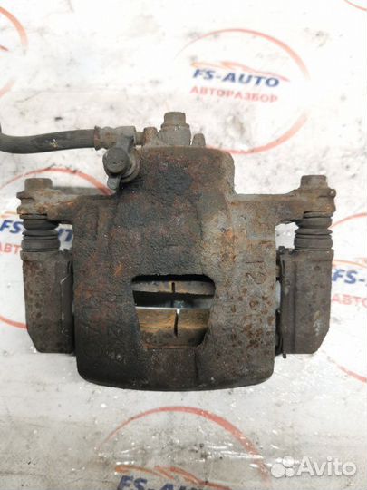 Суппорт тормозной передний правый Chevrolet Aveo T