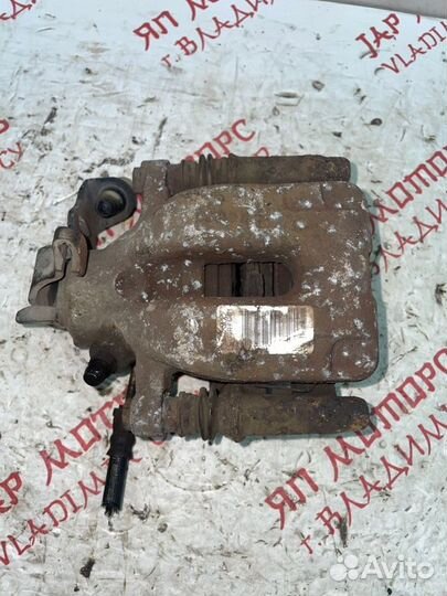 Суппорт тормозной задний правый Peugeot 3008