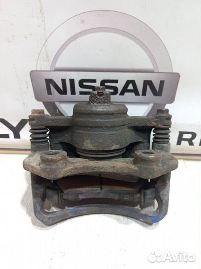 Суппорт тормозной перед Nissan almera classic B10