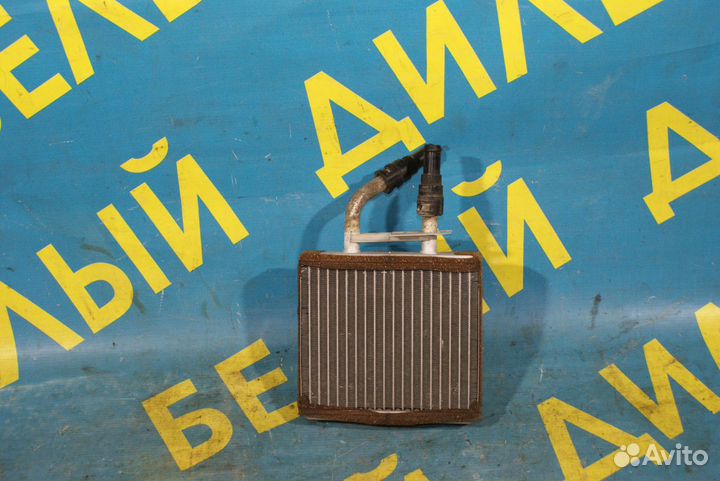 Радиатор печки Mazda 323F BA