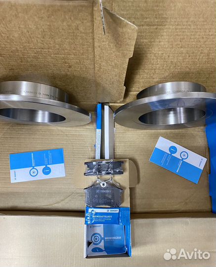 Тормозные диски и колодки задние Skoda Octavia A7